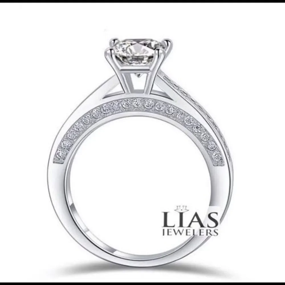 New 18k white gold engagement ring